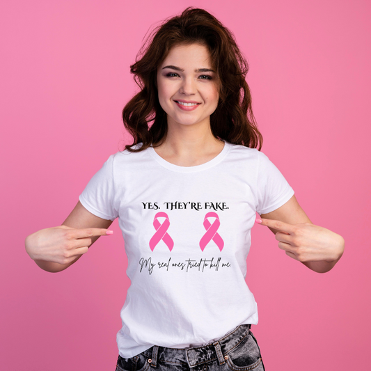 Yes They’re Fake My Real Ones Tried to Kill Me T-Shirt | Breast Cancer Survivor Pink Ribbon Tee | Funny Mastectomy Awareness Shirt